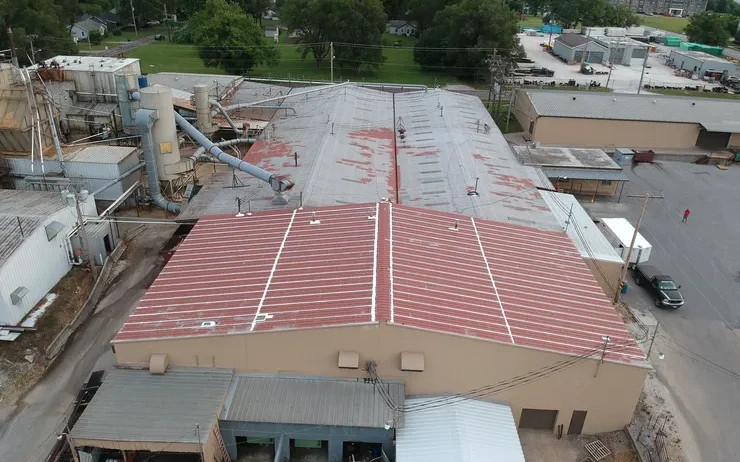 Vermillion - Gaco S4200 silicone coating over aged metal roof in Springfield, MO - Commercial Roof
